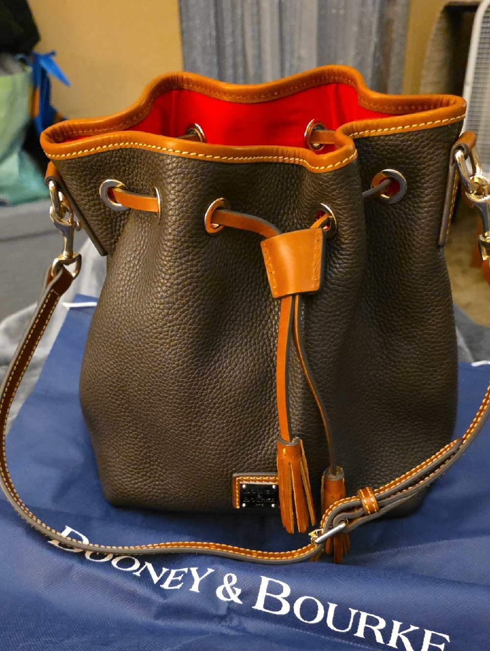 Dooney & Bourke Brown Leather Bucket Bag with Tan Trim and Red Interior